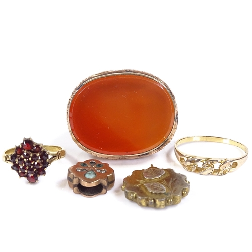 592 - Various jewellery, including a large gold plated carnelian fob seal, garnet ring, etc. (5)