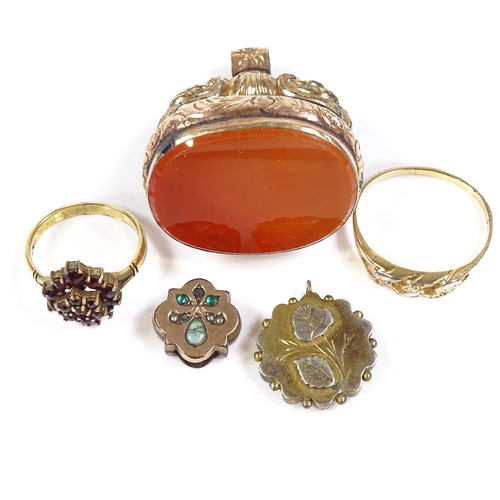 592 - Various jewellery, including a large gold plated carnelian fob seal, garnet ring, etc. (5)