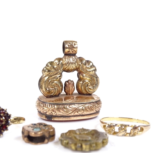 592 - Various jewellery, including a large gold plated carnelian fob seal, garnet ring, etc. (5)