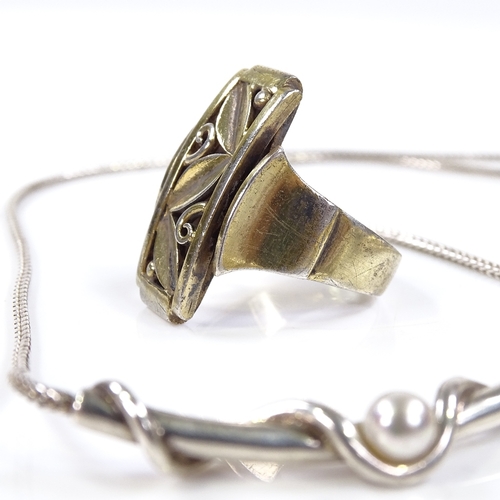 598 - A Soren Borup Danish sterling silver slave bangle, a sterling pearl necklace, vermeil silver ring an... 