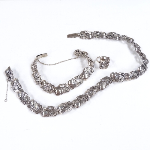 602 - A 1960s silver floral demi parure, comprising necklace, bracelet and ring, by Langstone Silver Works... 