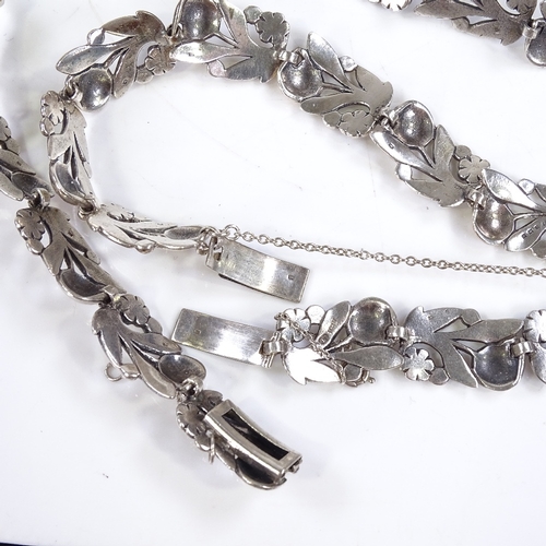 602 - A 1960s silver floral demi parure, comprising necklace, bracelet and ring, by Langstone Silver Works... 