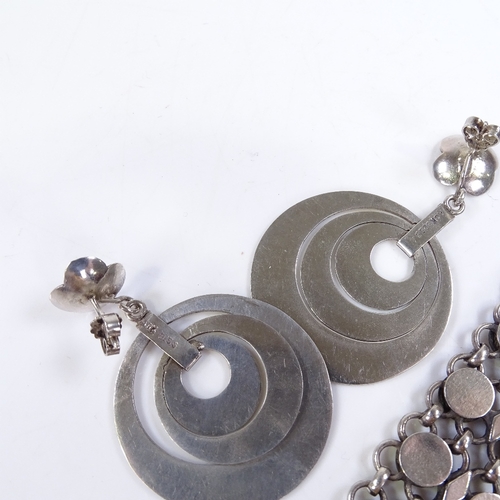 606 - A pair of Anne Gudme-Knudsen Danish sterling silver circular pendant earrings, Chinese sterling open... 