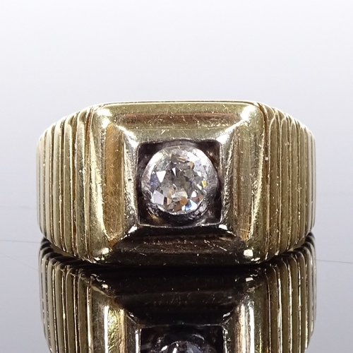 612 - A 14ct gold 0.3ct solitaire diamond gypsy ring, ribbed shoulders and bridge, setting height 11.6mm, ... 