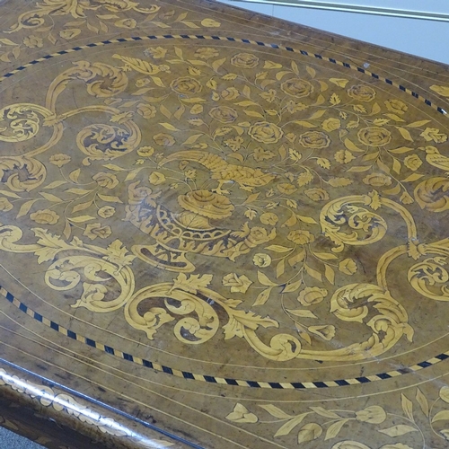 301 - An 18th century walnut and Dutch marquetry rectangular centre table, with allover elaborate exotic b... 