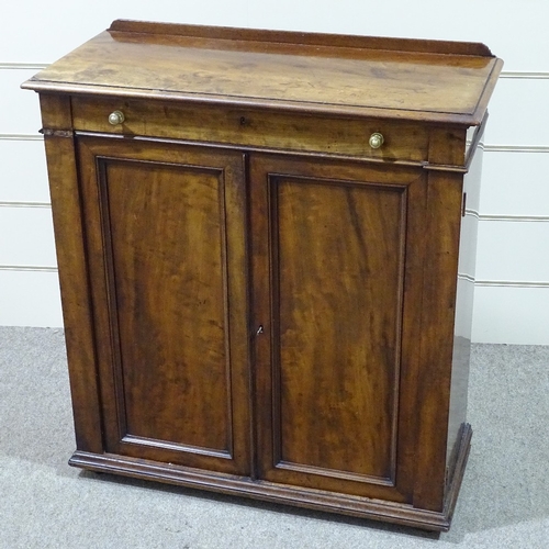 302 - A 19th century mahogany 2-door cupboard, with single frieze drawer and panelled cupboards under, wid... 