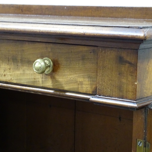 302 - A 19th century mahogany 2-door cupboard, with single frieze drawer and panelled cupboards under, wid... 