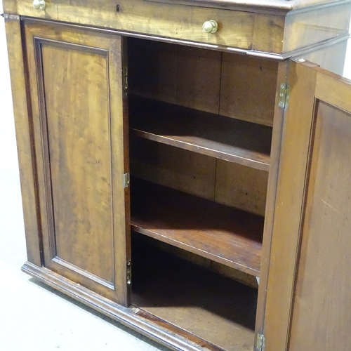 302 - A 19th century mahogany 2-door cupboard, with single frieze drawer and panelled cupboards under, wid... 