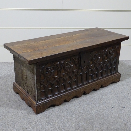 306 - An Antique oak coffer of plank construction, width 3'5