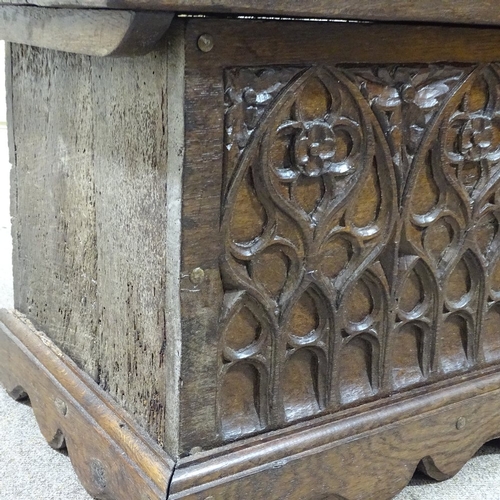 306 - An Antique oak coffer of plank construction, width 3'5