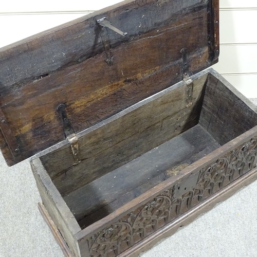 306 - An Antique oak coffer of plank construction, width 3'5