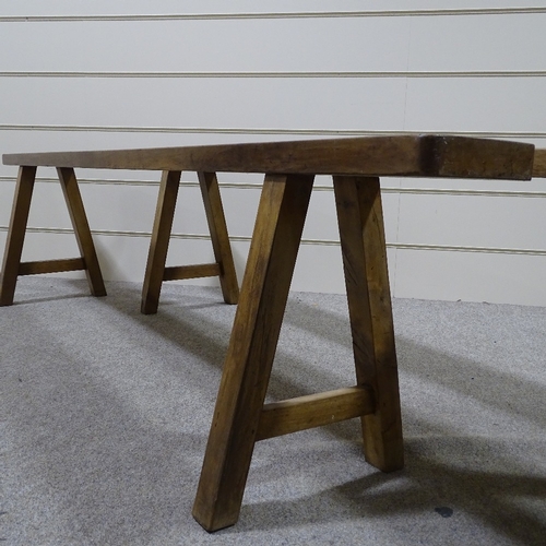 309 - A pair of 19th century beech tressle benches, length 6'6