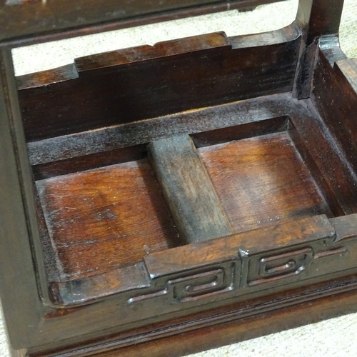 312 - A nest of Chinese hardwood occasional tables with carved friezes, largest table 20