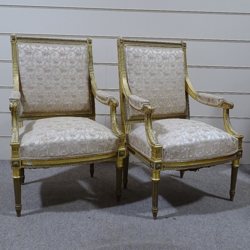 319 - A pair of 19th century French carved giltwood-framed open armchairs