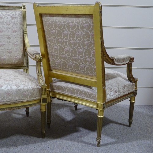 319 - A pair of 19th century French carved giltwood-framed open armchairs