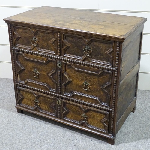 324 - An early 18th century joined oak chest of 3 long drawers, with moulded fielded panelled drawer front... 