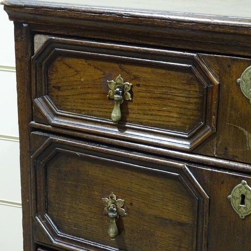 331 - An 18th century oak chest of 3 long drawers, with moulded fielded drawer fronts, width 2'10