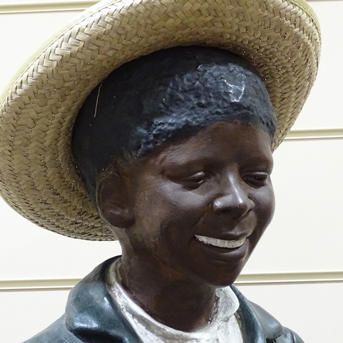 337 - A life size painted plaster advertising shoeshine boy figure