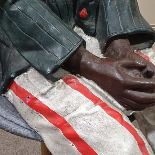 337 - A life size painted plaster advertising shoeshine boy figure