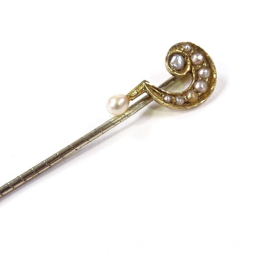 546 - An Edwardian 15ct gold split-pearl question mark stick pin, overall length 55.6mm, 0.9g