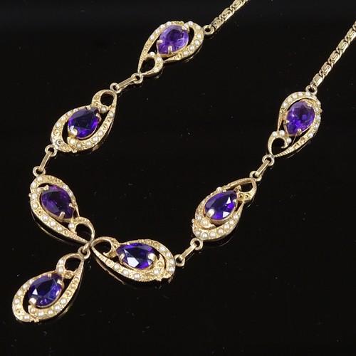 502 - A 14ct gold amethyst and split pearl collar necklace, pierced and scrolled decoration with pear-cut ... 