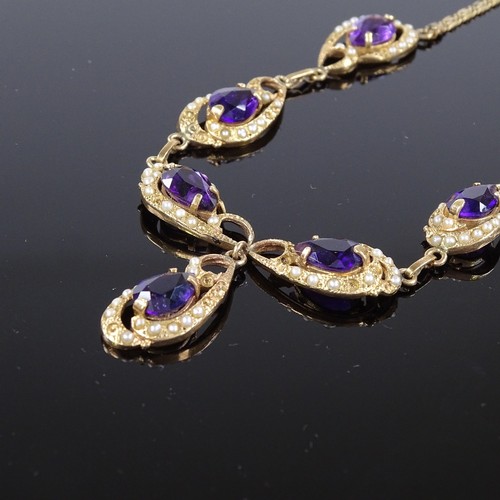 502 - A 14ct gold amethyst and split pearl collar necklace, pierced and scrolled decoration with pear-cut ... 