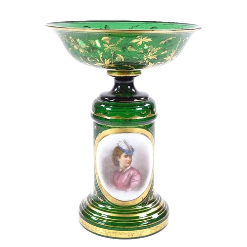 212 - A 19th century Bohemian green glass tazza with painted portrait panel, diameter 19cm, height 25cm, c... 