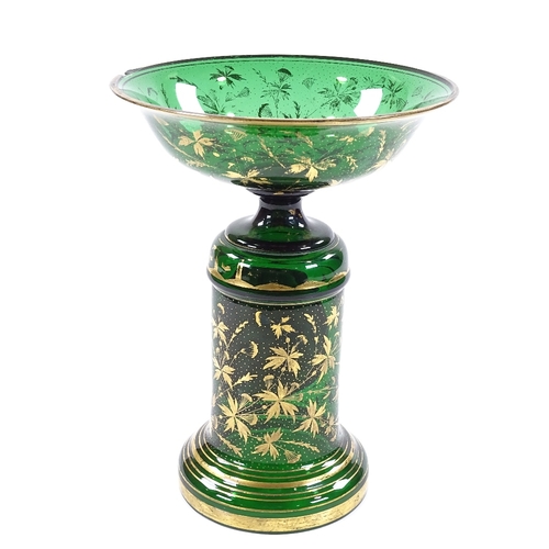 212 - A 19th century Bohemian green glass tazza with painted portrait panel, diameter 19cm, height 25cm, c... 