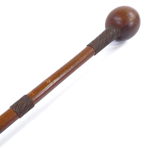 215 - A Zulu hardwood knobkerry with wire-bound handle, length 76cm