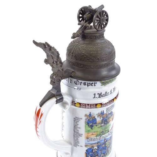 216 - A Kaiser porcelain beer stein with transfer decorated military scenes, and pewter lid surmounted by ... 