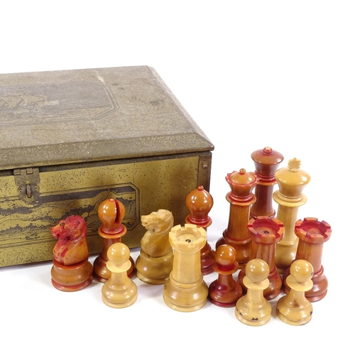 218 - A carved and stained nut or vegetable ivory chess set, late 19th/early 20th century, King height 8.5... 