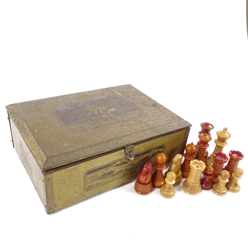 218 - A carved and stained nut or vegetable ivory chess set, late 19th/early 20th century, King height 8.5... 