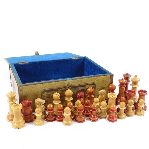 218 - A carved and stained nut or vegetable ivory chess set, late 19th/early 20th century, King height 8.5... 