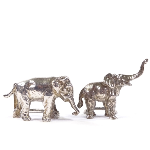 656 - A pair of George V cast-silver elephant menu / name place holders, by S Blanckensee & Sons Ltd, hall... 