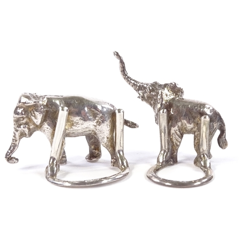 656 - A pair of George V cast-silver elephant menu / name place holders, by S Blanckensee & Sons Ltd, hall... 