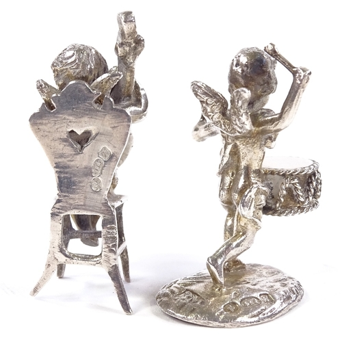 659 - 2 Edwardian Continental novelty miniature silver cherub musicians, comprising stringed and percussio... 