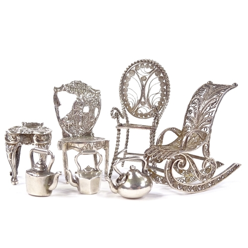 660 - A group of Continental silver dolls house furniture, including filigree rocking chair, Dutch side ch... 