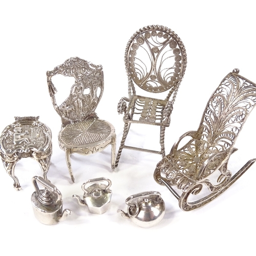 660 - A group of Continental silver dolls house furniture, including filigree rocking chair, Dutch side ch... 