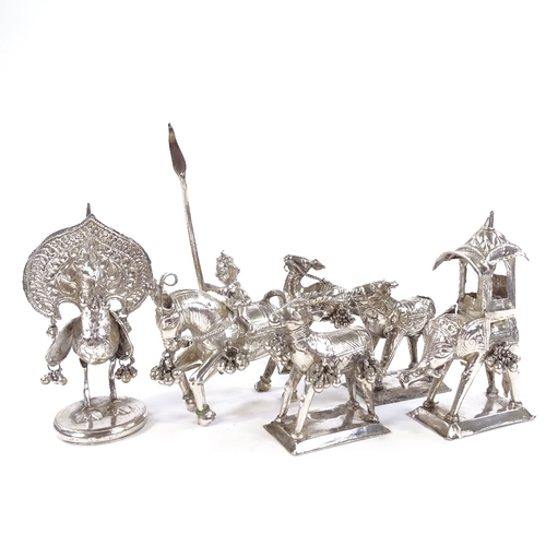 662 - A group of 6 Middle Eastern unmarked white metal animal figures, including elephant, peacock and kni... 