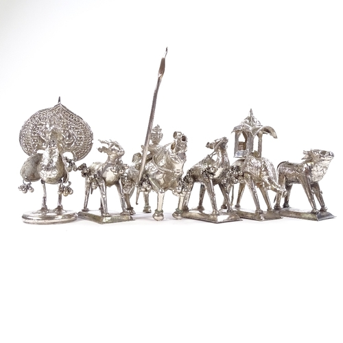 662 - A group of 6 Middle Eastern unmarked white metal animal figures, including elephant, peacock and kni... 