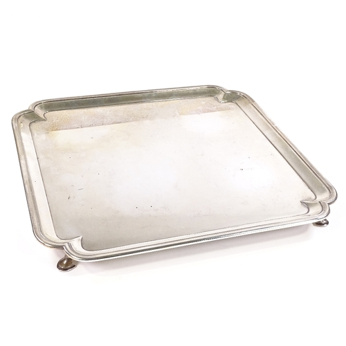 677 - A large square silver tray, scalloped corners, by Thomas Bradbury & Sons Ltd, hallmarks Sheffield 19... 