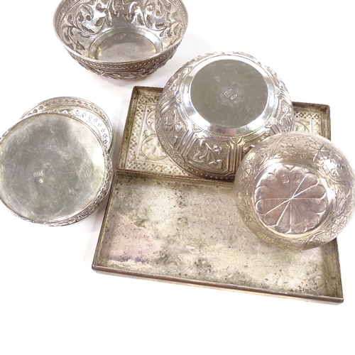 682 - A group of Eastern silver items, including rectangular box, pair of bowls etc, with relief embossed ... 