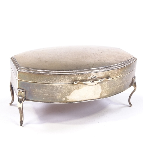 689 - A George V silver jewel box, bowed rectangular form with interior gilt lid and felt lining, by E S B... 