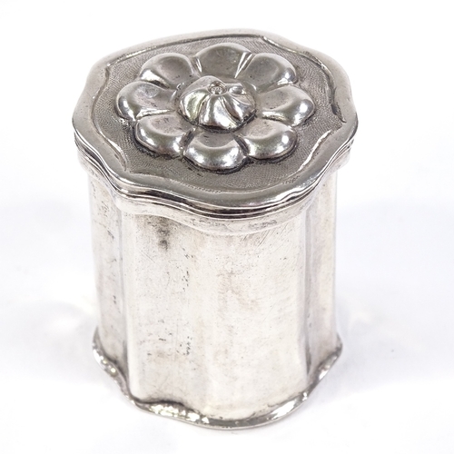 698 - An 18th century German silver snuffbox, with relief embossed floral lid and marks to base, height 4c... 