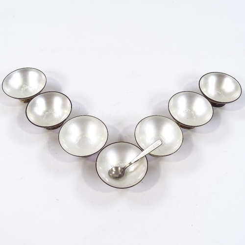 700 - A set of 7 Volmer Bahner Danish vermeil silver and white enamel salt bowls, and a matching spoon, ma... 