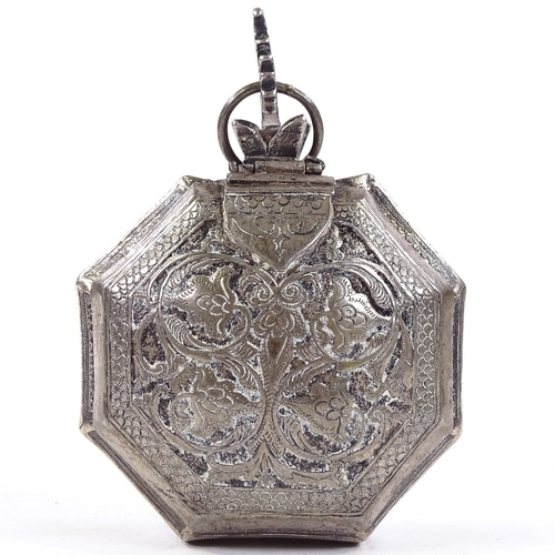 715 - An Eastern unmarked white metal Pandan/Betel nut box, with relief and engraved floral decoration and... 