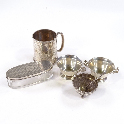 719 - Various silverware, comprising christening mug, pair of 2-handled salts, Eastern embossed salt and d... 