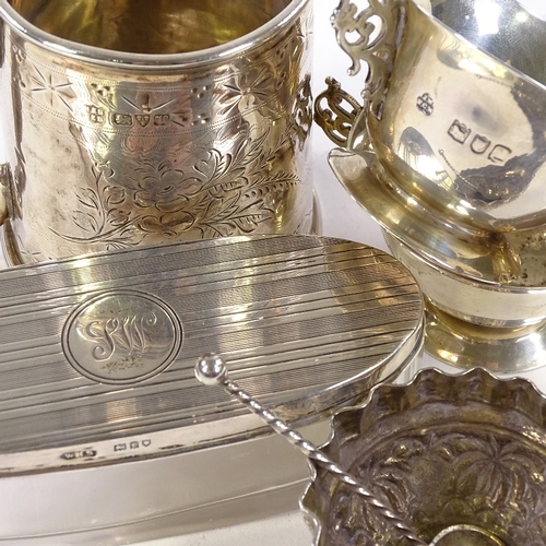 719 - Various silverware, comprising christening mug, pair of 2-handled salts, Eastern embossed salt and d... 