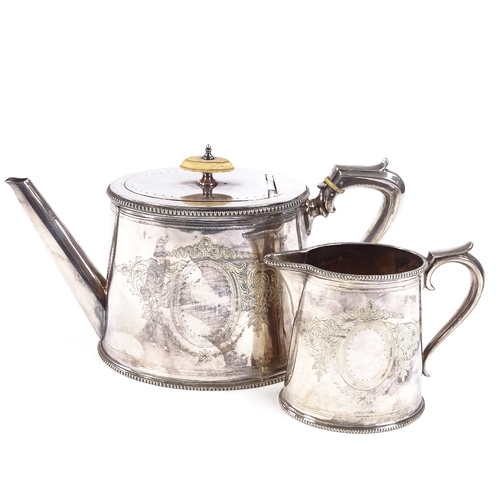 722 - An Elkington & Co silver plated oval teapot and cream jug, ivory insulators with floral engraved dec... 