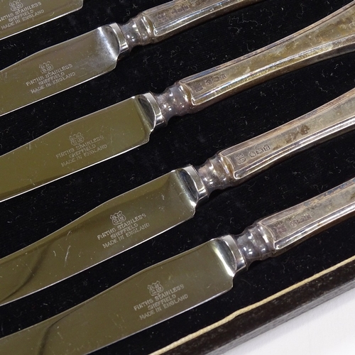 723 - 2 sets of 6 silver-handled fruit knives and a cased silver plated carving set (3)